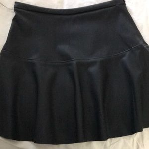 Black leather mini skirt